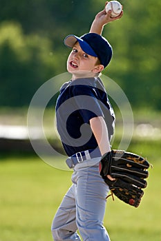 Young boy baseball pitcher