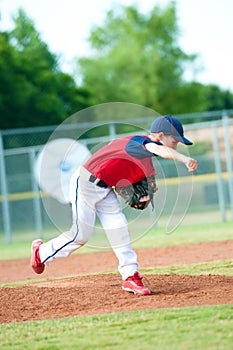 Young boy baseball pitcher