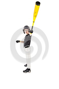 Young boy baseball player showing off with his bat extended