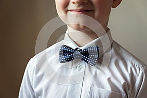 Young boy with blue bow tie