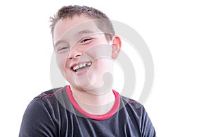Young Boy with Braces on Teeth Laughing in Studio