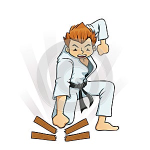 Young Boy Breaking Boards in Karate Uniforms