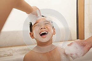 Young Boy in Bubble Bath