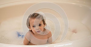 Young boy in a bubble bath