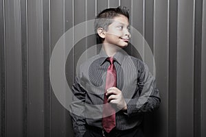 Young boy in business attire