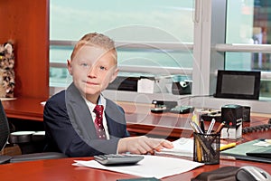 Young Boy in Business Office