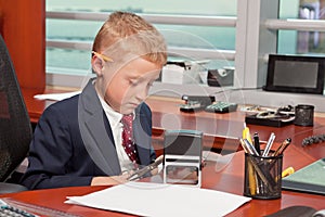 Young Boy in Business Office