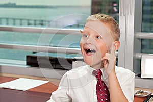 Young Boy in Business Office
