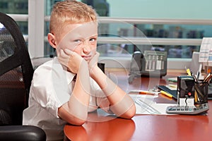 Young Boy in Business Office