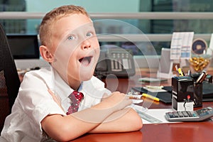 Young Boy in Business Office