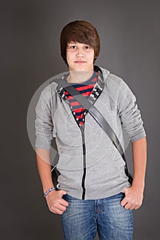 Young Boy in casual look with his slingbag