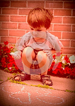 Young boy chalk drawing