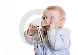 Young boy chew book photo