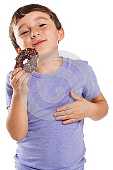 Young boy child eating donut unhealthy sweet sweets isolated on white
