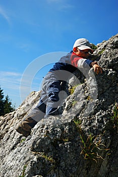 Young boy climbing