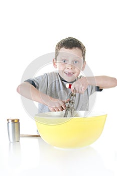 Young boy cooking