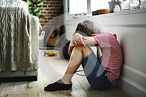 Young boy with depression alone photo