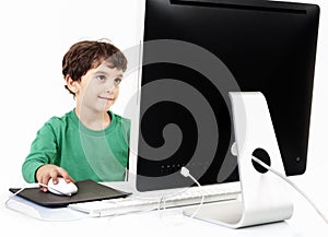 Young boy with desktop computer