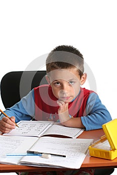 Young boy doing homework