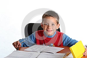 Young boy doing homework