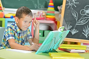 Young boy doing homework