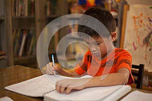 Young boy doing school work