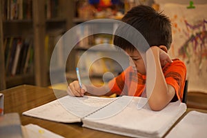 Young boy doing school work