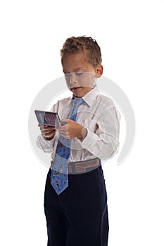 Young boy dressed as businessman sends SMS