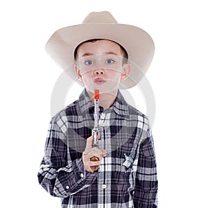 Young boy dressed as a cowboy