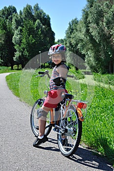 Young boy drive bicycle