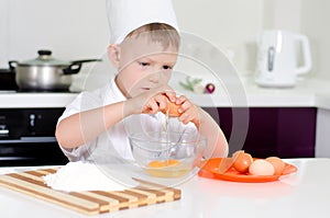 Young boy earning to be a chef