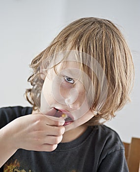 Young boy eating
