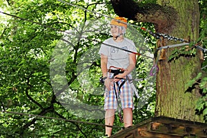 Young boy engaged in climbing