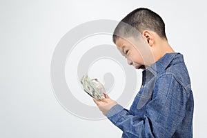 Young boy excite with bank note