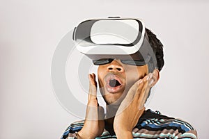 Young boy experiencing virtual reality headset