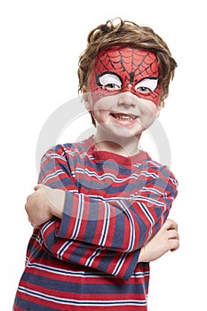 Young boy with face painting spiderman