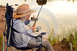 Young Boy Fishing on a lake