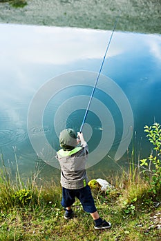 Young boy with fishing pole