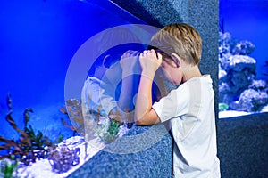 Young boy focusing an algae