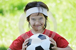 Young boy with football soccer