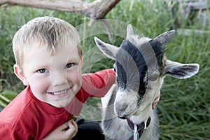 Young boy with goat