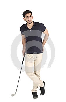 Young boy with golf stick in hand.