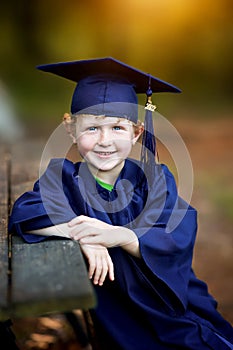 Young boy in graduation attire