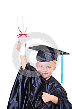 Young boy in graduation dress