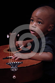 Young boy with guitar