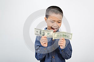 Young boy with happy and smile with american dollar