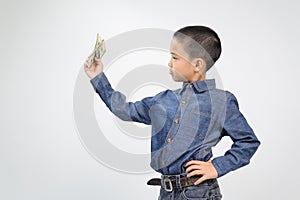 Young boy with happy and smile with american dollar