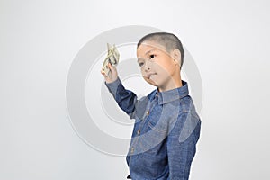 Young boy with happy and smile with american dollar