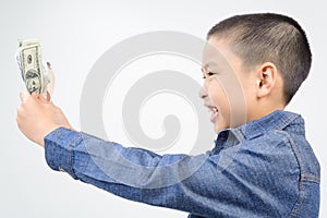 Young boy with happy and smile with bank note