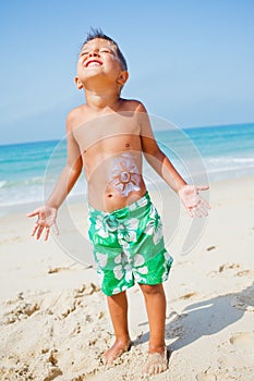 Young boy having fun at the beach